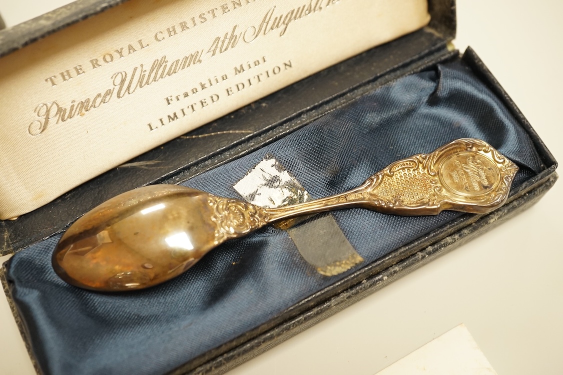 A cased set of six George VI silver teaspoons, James Dixon & Sons, Sheffield, 1948, a cased set of six silver and polychrome enamel coffee spoons and a cased single silver spoon.